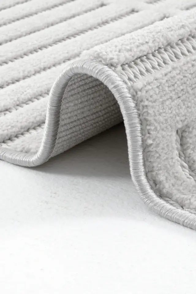 Dekorenti Prag 9203 Açık Gri – Modern Örgü Saçaklı Yumuşak Tuşeli İskandinav Halı